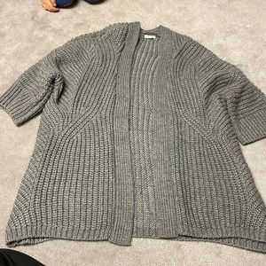 Maurice’s grey cardigan. Size M